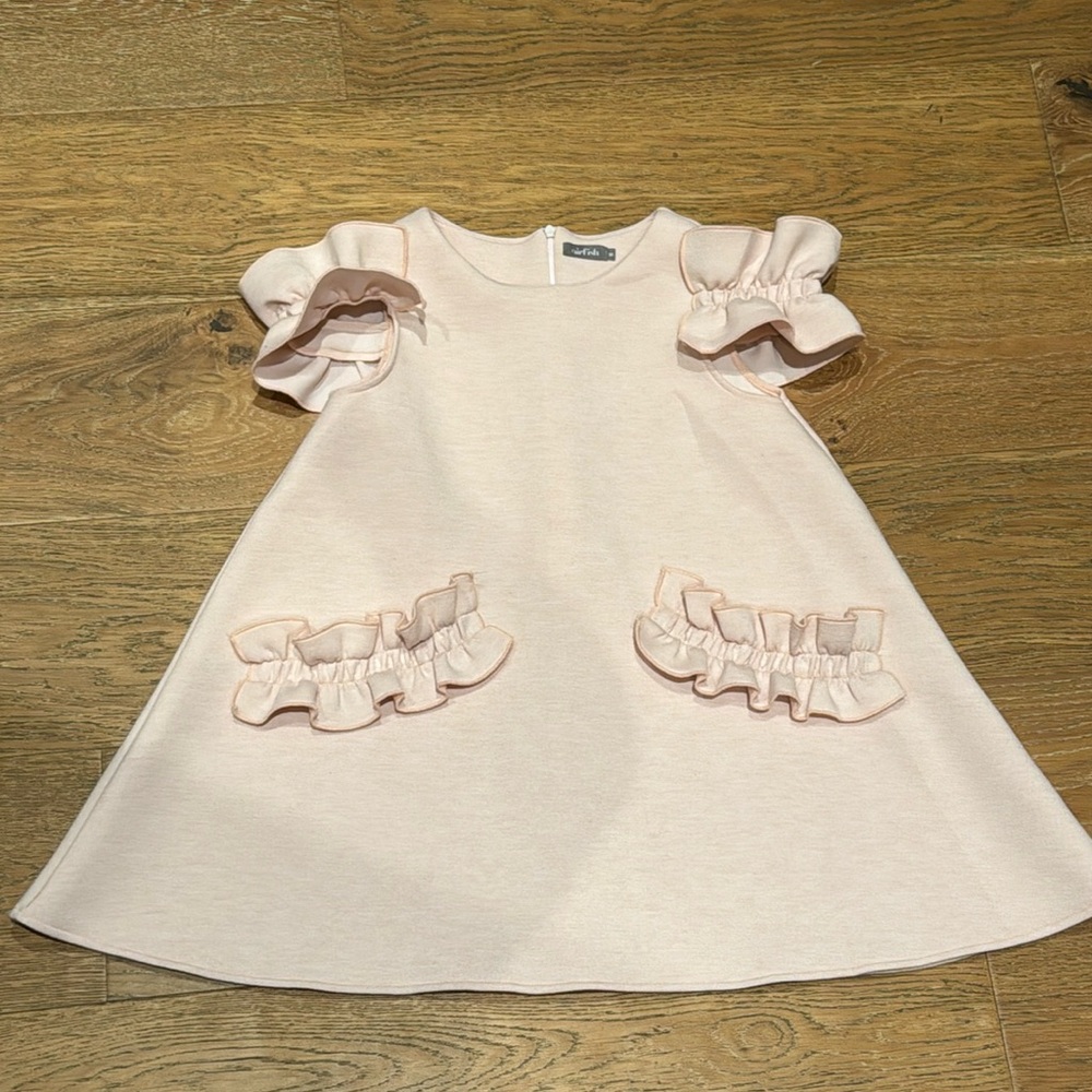 Selling a light pink kids dress